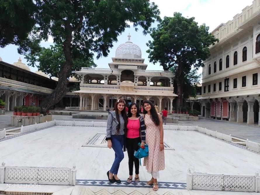 Sadbhavana Bhardwaj shown with her friends and family visiting a temple.
