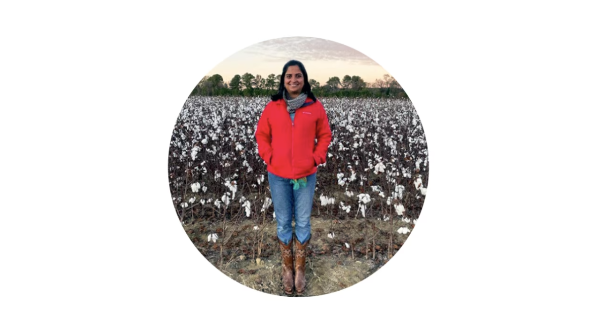 Shilpa Swarup stood in a crop field 