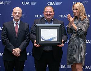 Mark Salatino receiving the Consumer Bankers Association Executive Banking School's top award.