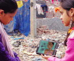 children looking at a computer