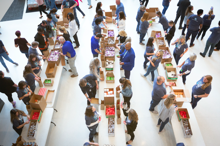 Overhead photo of people packing food