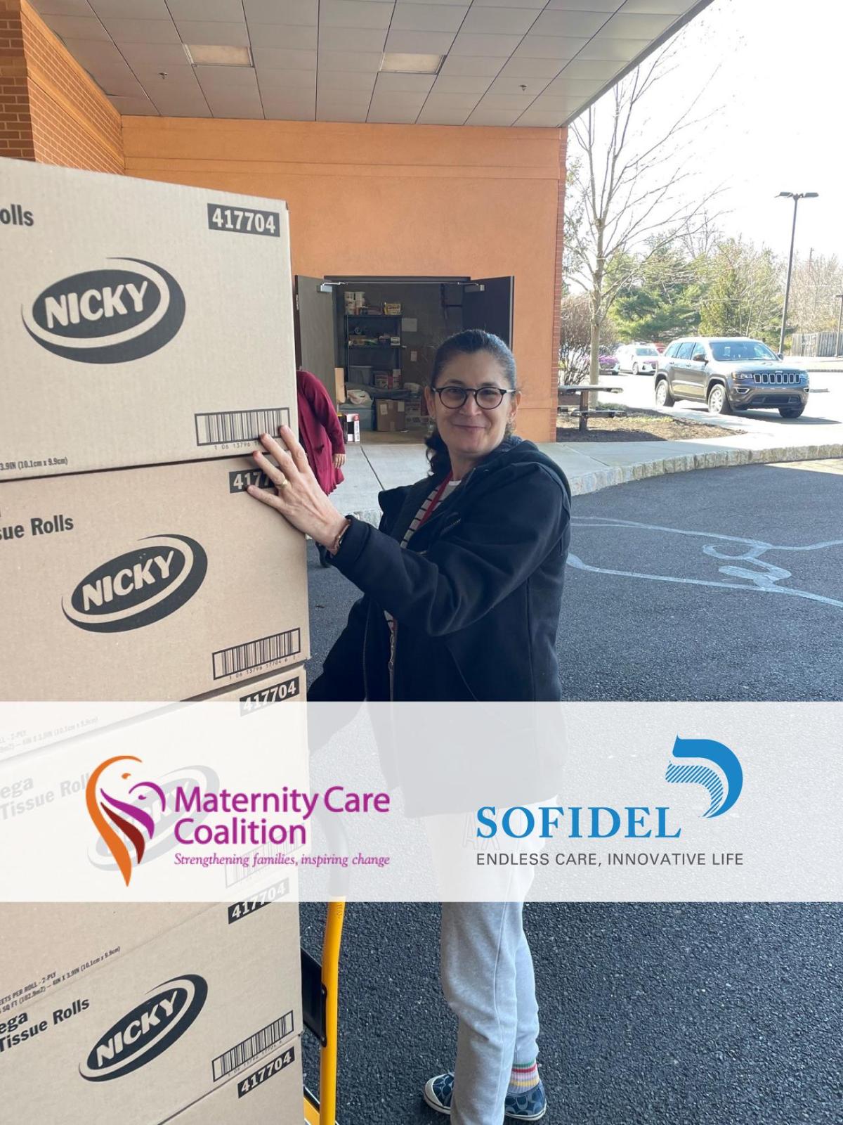Angie Bellow, Maternity Care Coalition receiving the delivery