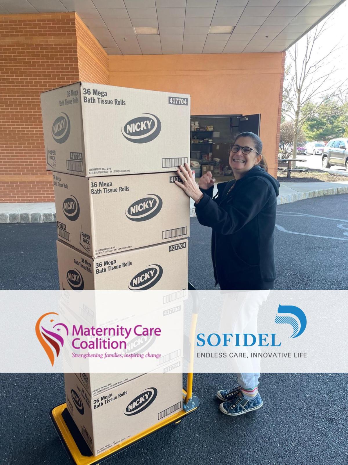 Angie Bellow, Maternity Care Coalition receiving the delivery