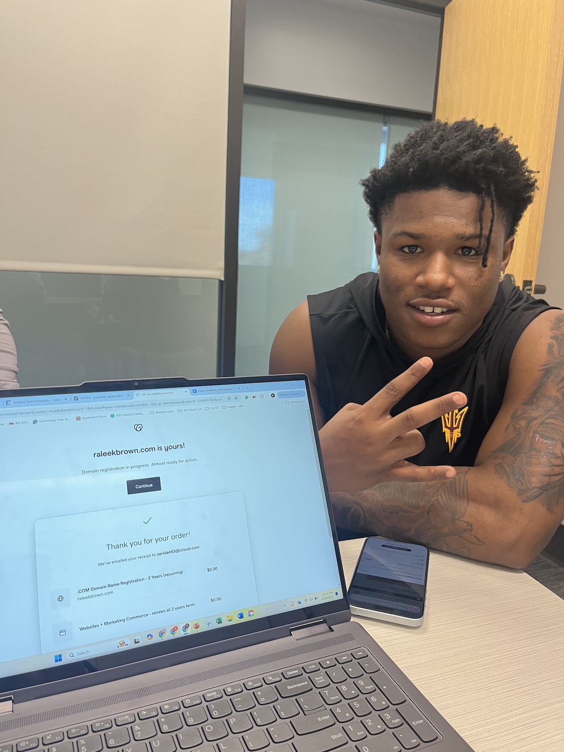 A student athlete registers a website domain at the Student-Athlete Venture Studio — student-athletes