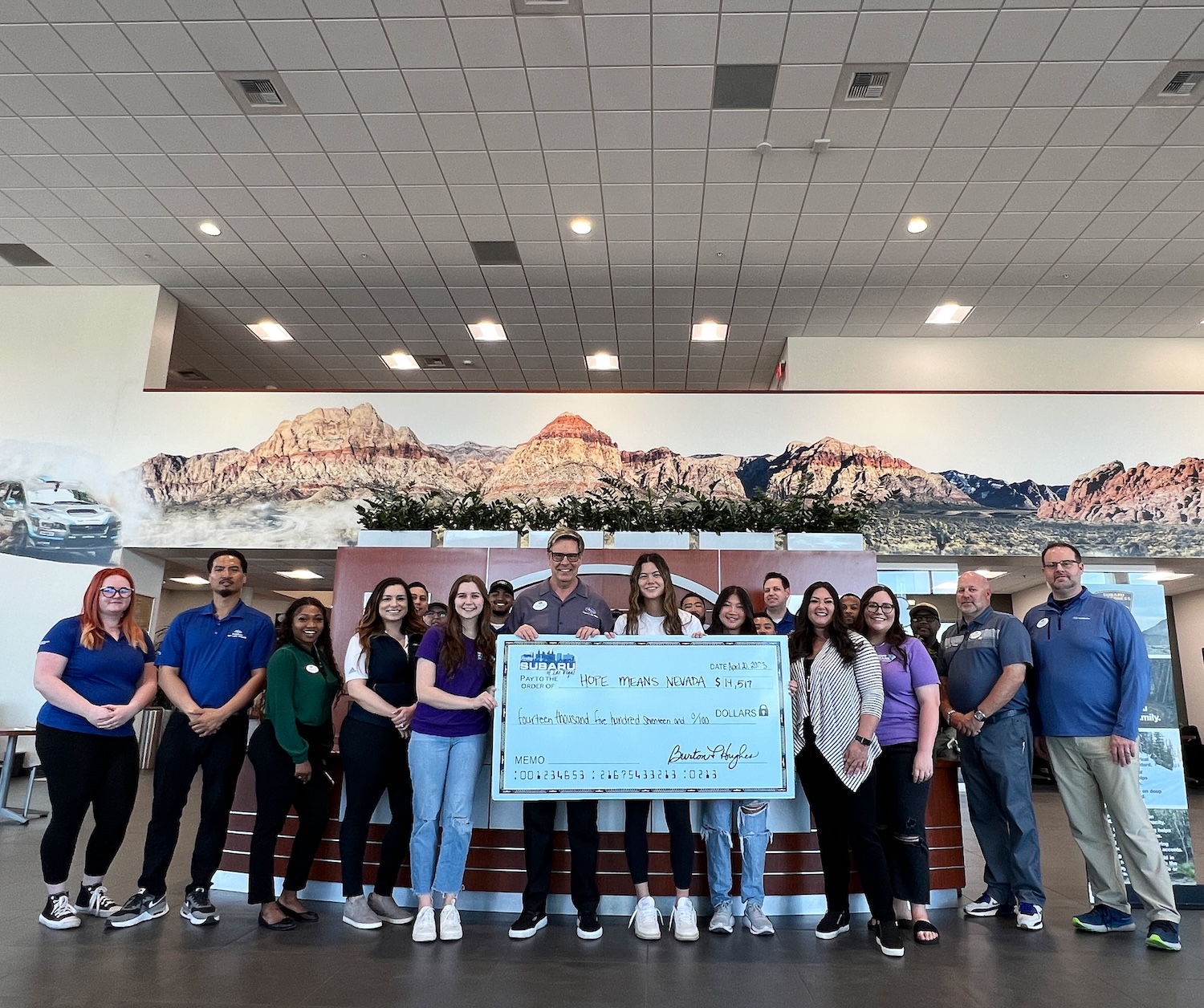 Subaru of Las vegas employees present donation to Hope Means Nevada