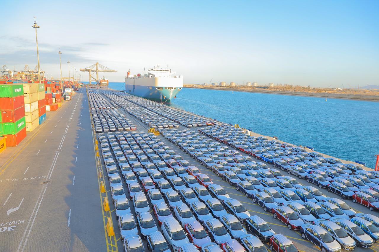 Rows of cars at port, ready to be shipped