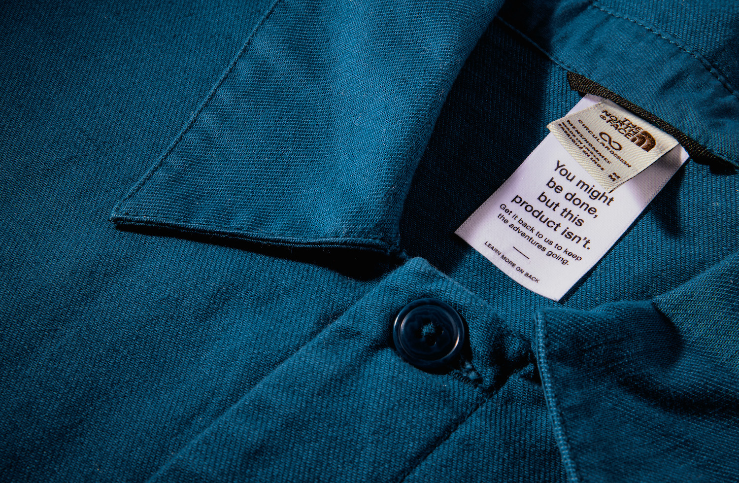 A clothing tag on The North Face's circular design line encouraging consumers to return the product when they're done using it.