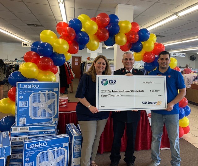 TXU Energy, kicks off 2022 Beat the Heat Program with balloon rainbow, fans, a/c's and a big check