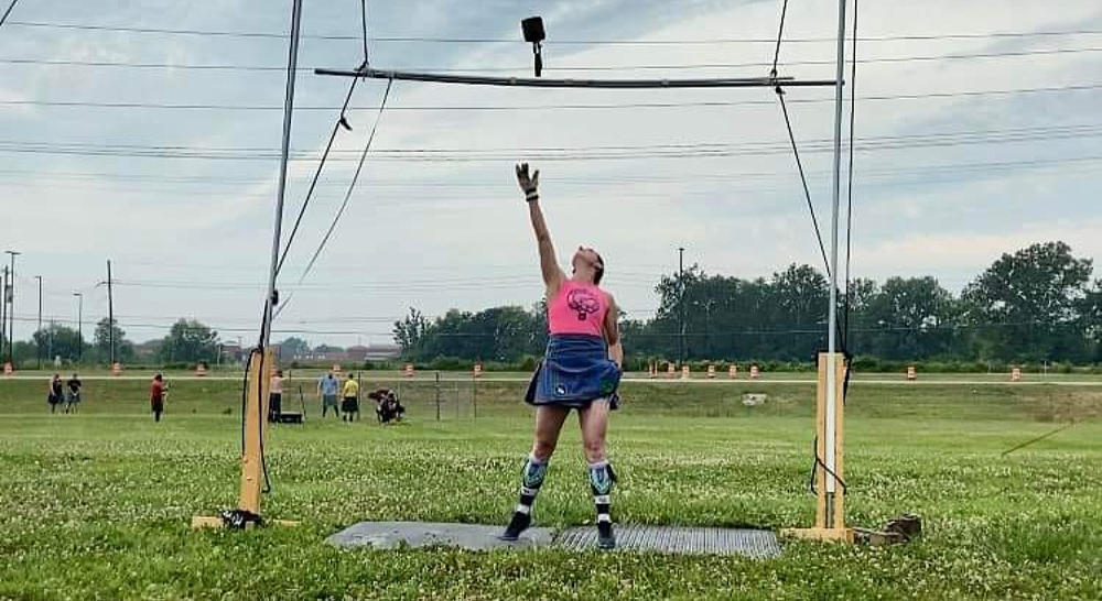 Tara Chippewa competing in the weight throw at the Highland Games.