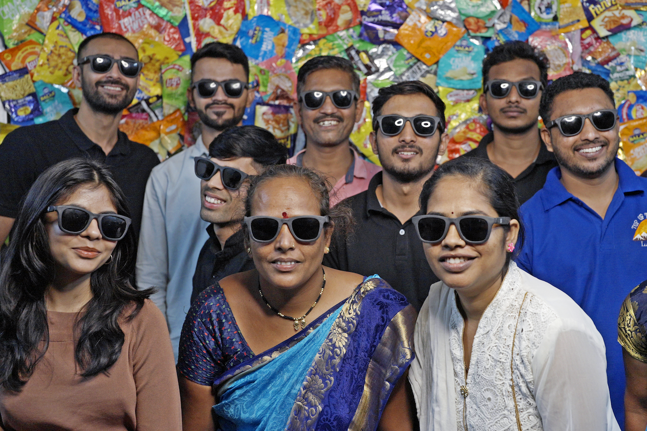 Team Wearing Sunglasses made from recycled chip bags - sustainability solutions