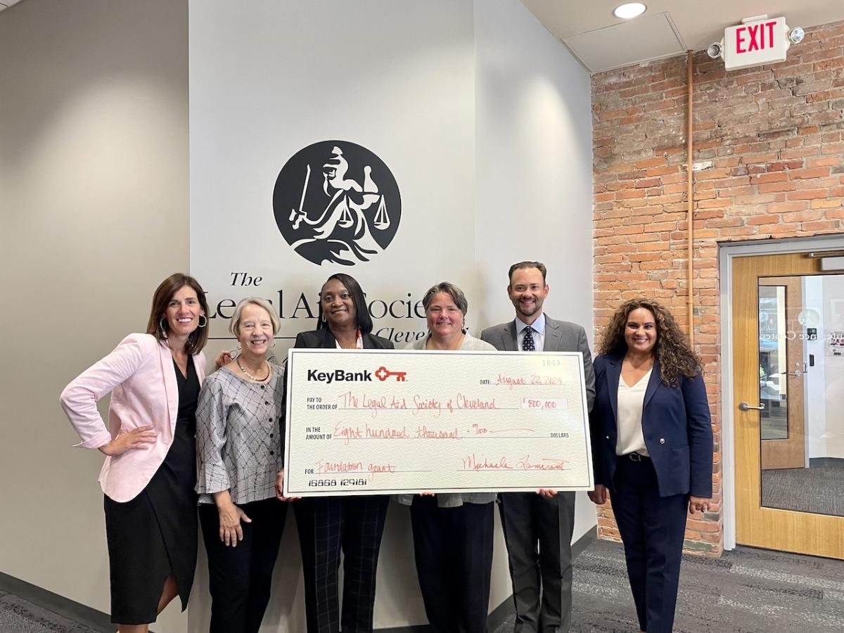 KeyBank Cleveland team members present an $800,000 check to Legal Aid Society Cleveland.