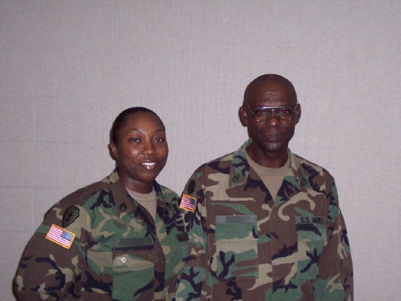 Tinisha Roberts in military uniform next to another person.