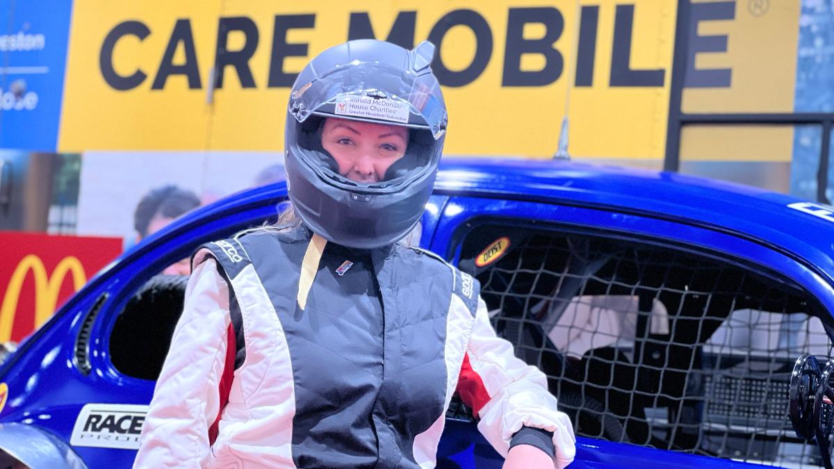 Alma Winkel, a commercial banker for U.S. Bank, outside her racing team’s vehicle.