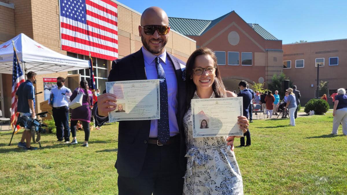 Roman and his sister after their naturalization ceremony to become U.S. citizens.