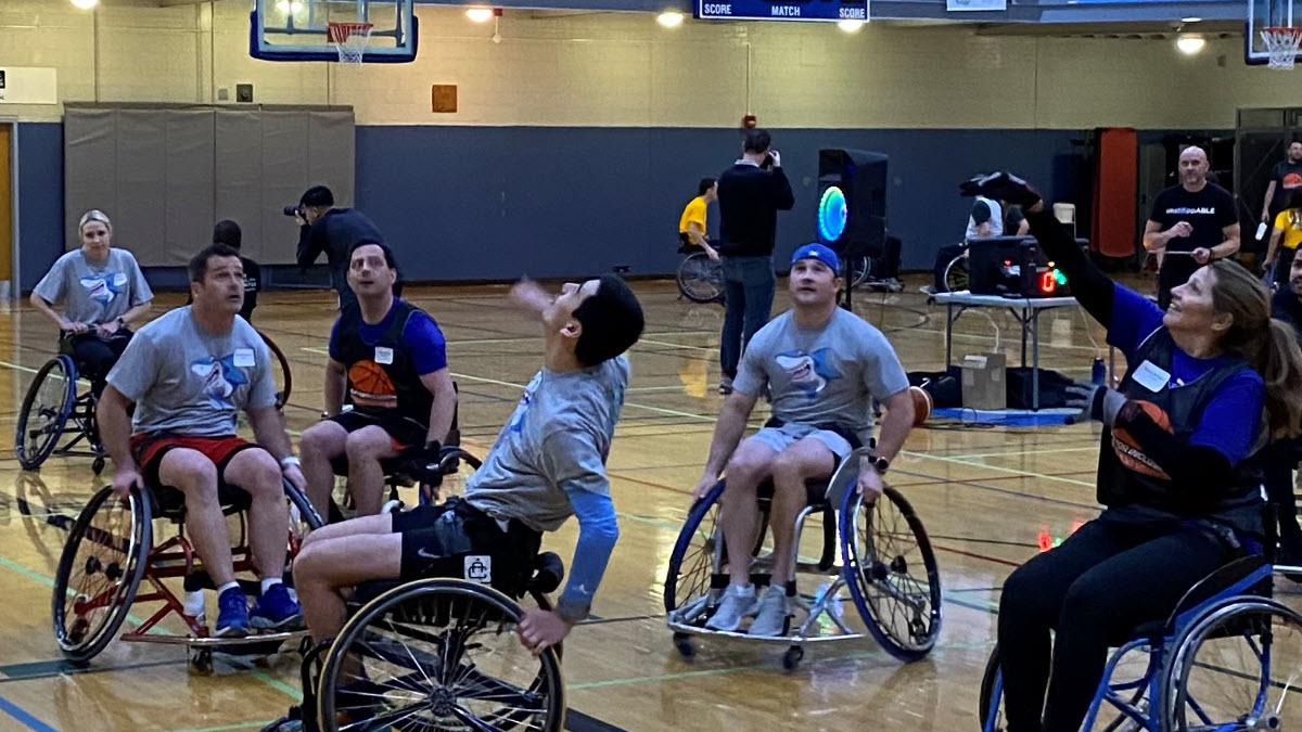 The U.S. Bank team playing wheelchair basketball.