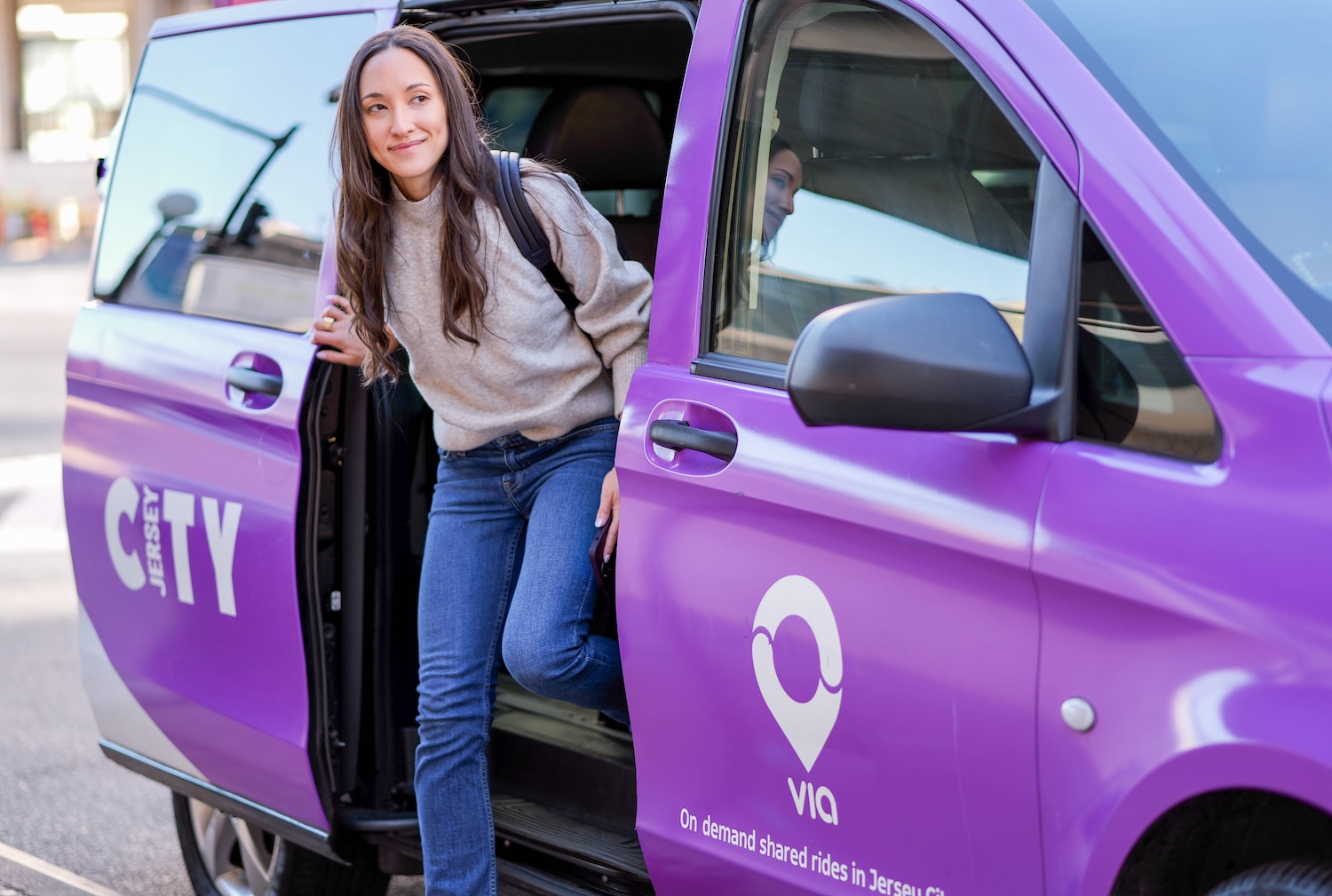 Via Jersey City - rider using microtransit