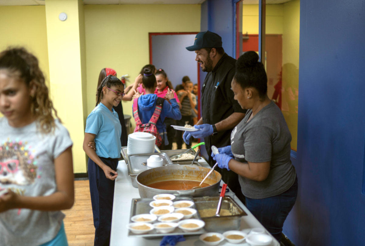 volunteers serving food