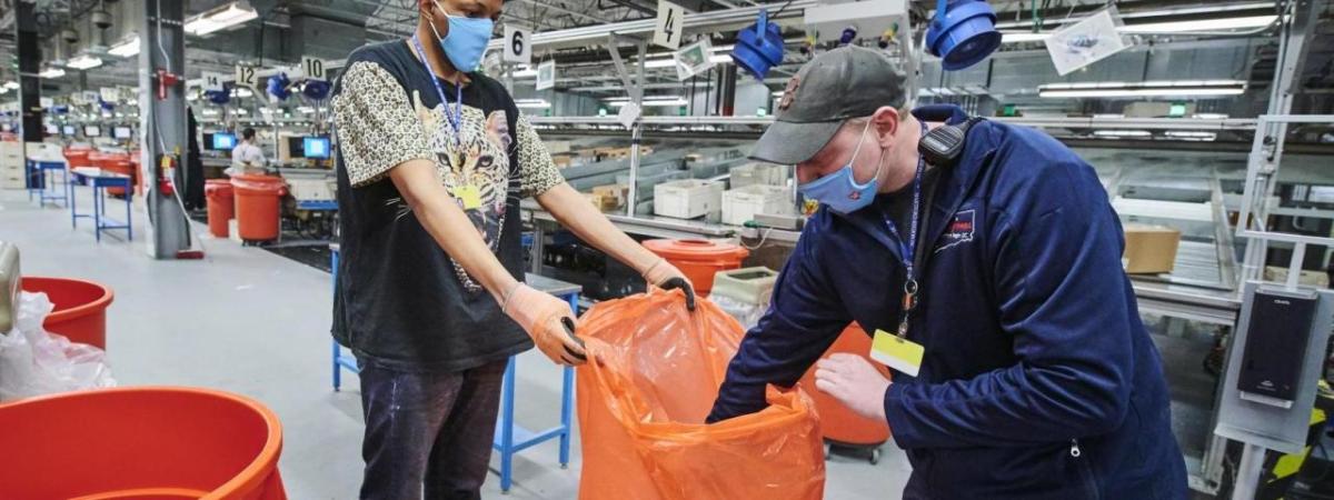 employees collecting garbage