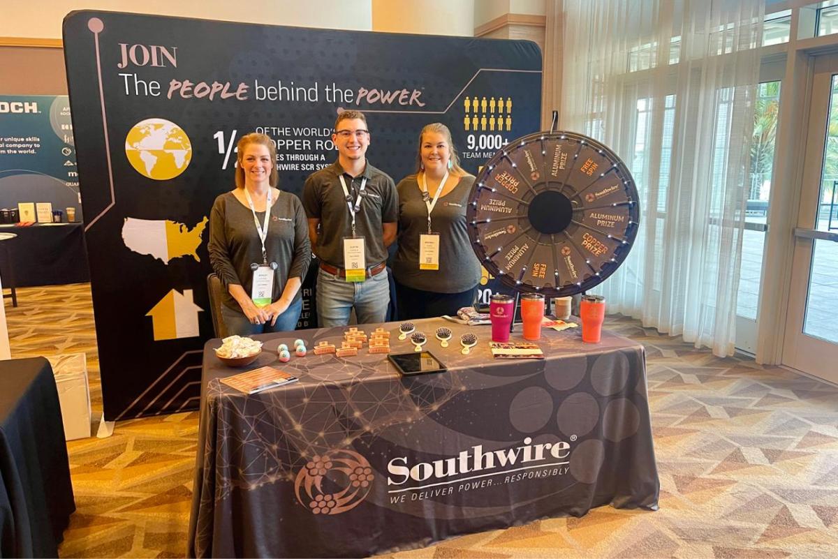 3 employees at a Southwire booth
