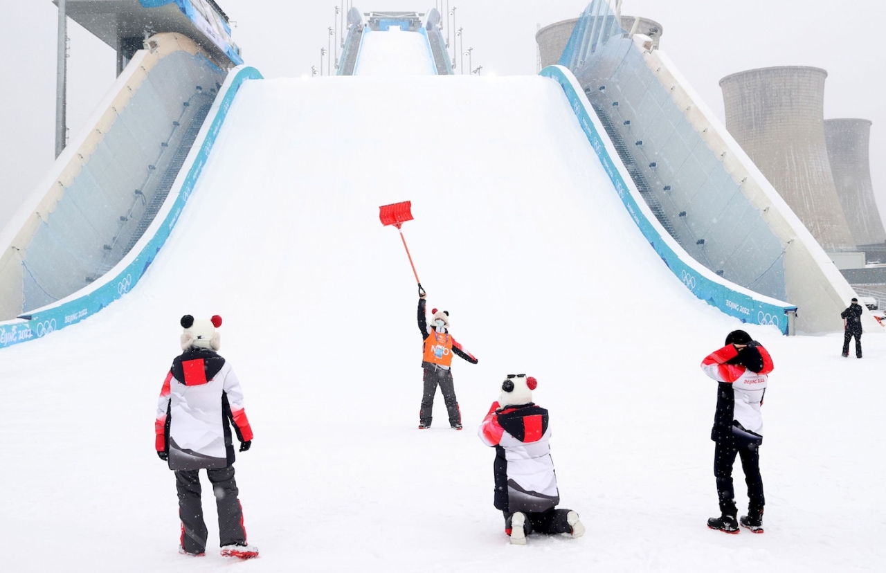 winter olympic apparatus with children playing