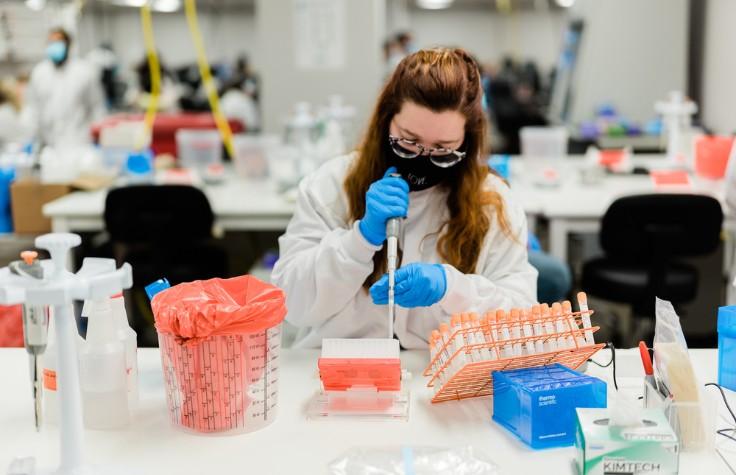 Aegis lab technician working with samples.