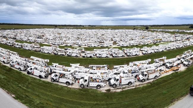 Wide angle view of Duke Energy vehicles
