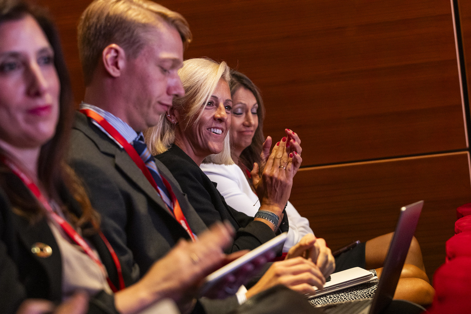 attendees at climate week 2023 clap as california governor gavin newsom says he will sign bills that mandate climate disclosure