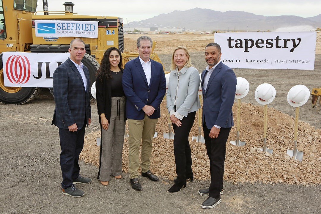 Joanne Crevoiserat and four others at a ground breaking ceremony.