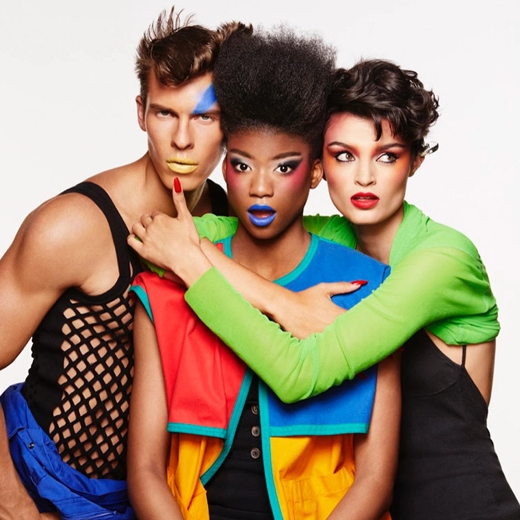 Three people modeling Viva Glam lipsticks