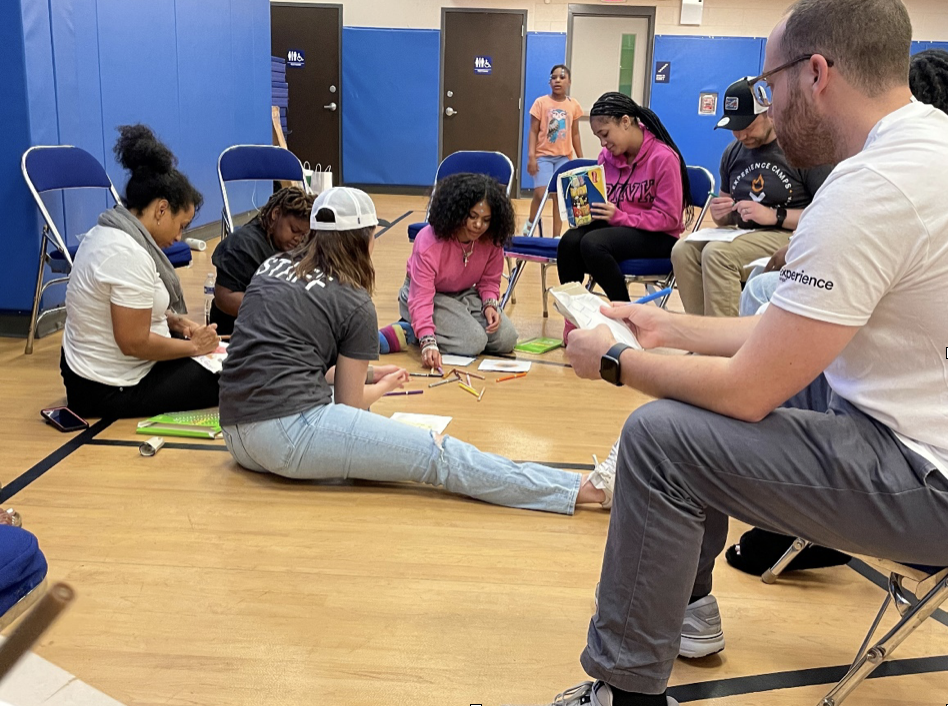 Participants on the floor at a workshop