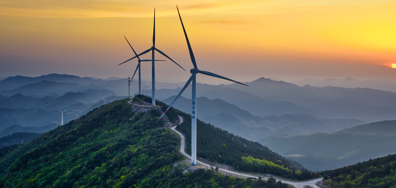 wind turbines at sunset