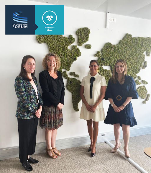 first lady of colombia with 3 others in front of a map of the world