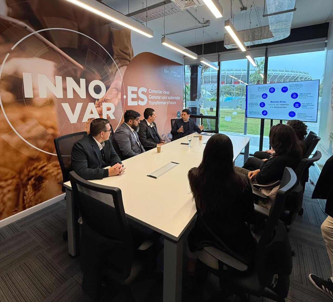 People seated at a conference table