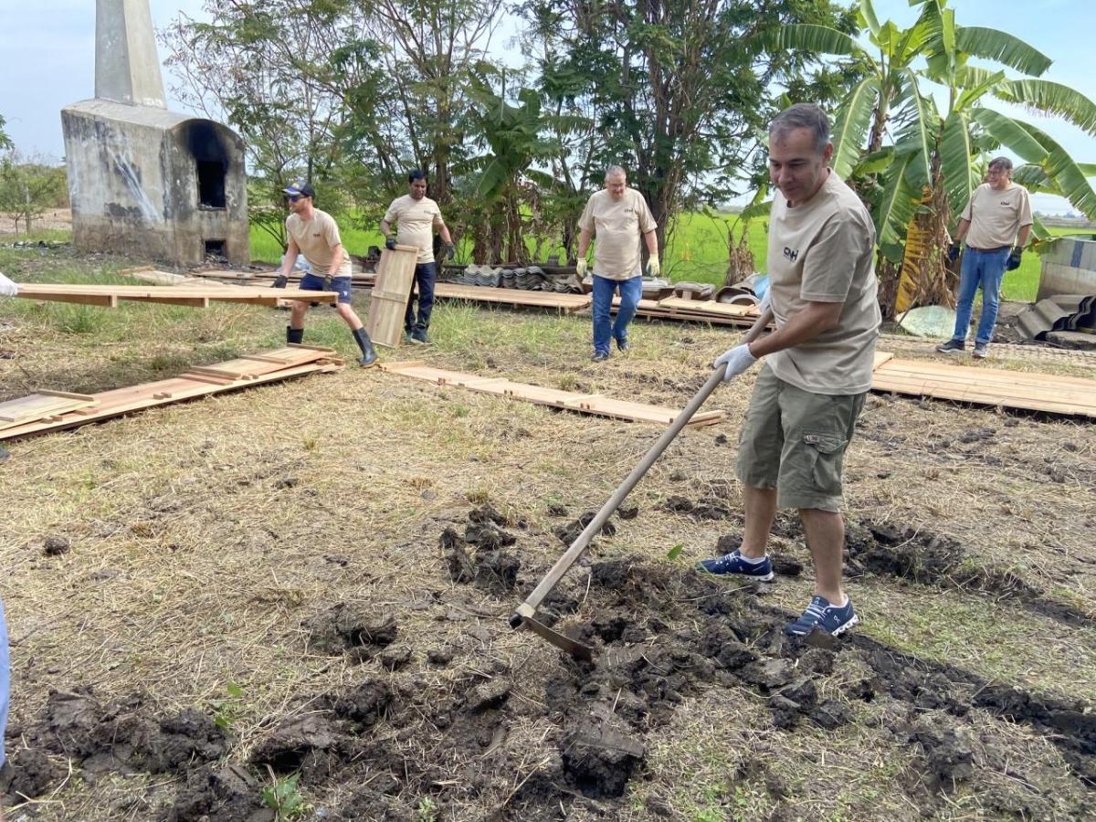 volunteers help build a garden
