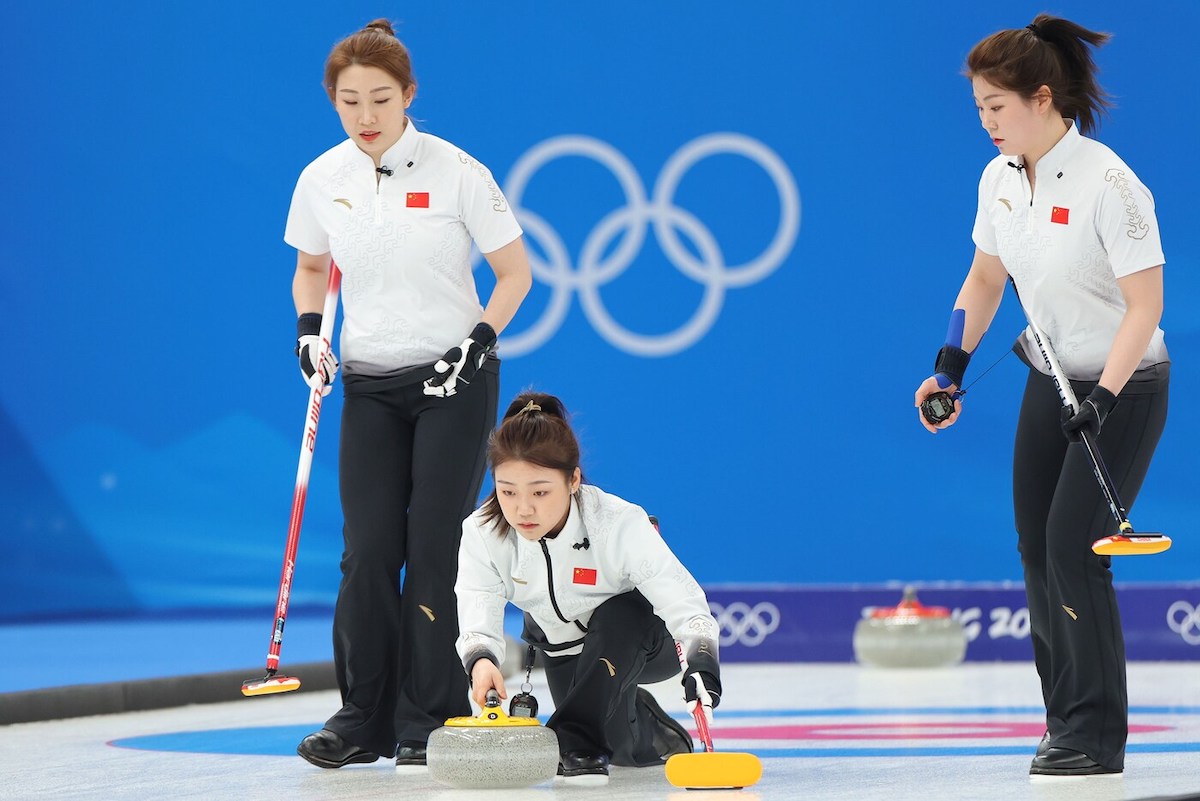 3 curling teammates