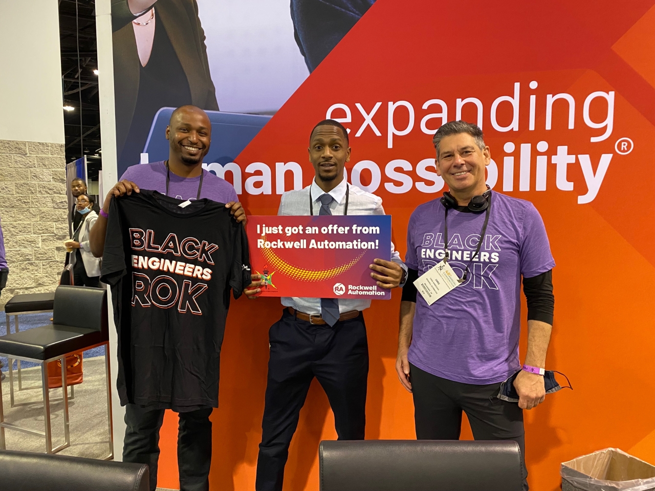 NSBE attendee Ladonte Cole (center) celebrates his offer with Rockwell’s Cheldon Brown (left) and Chris Nardecchia. 