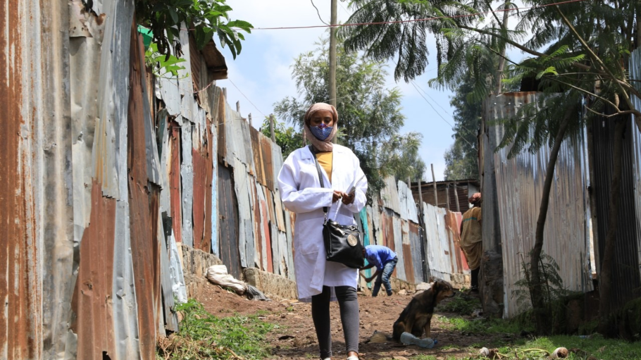 Doctor in Ethiopia holding purse