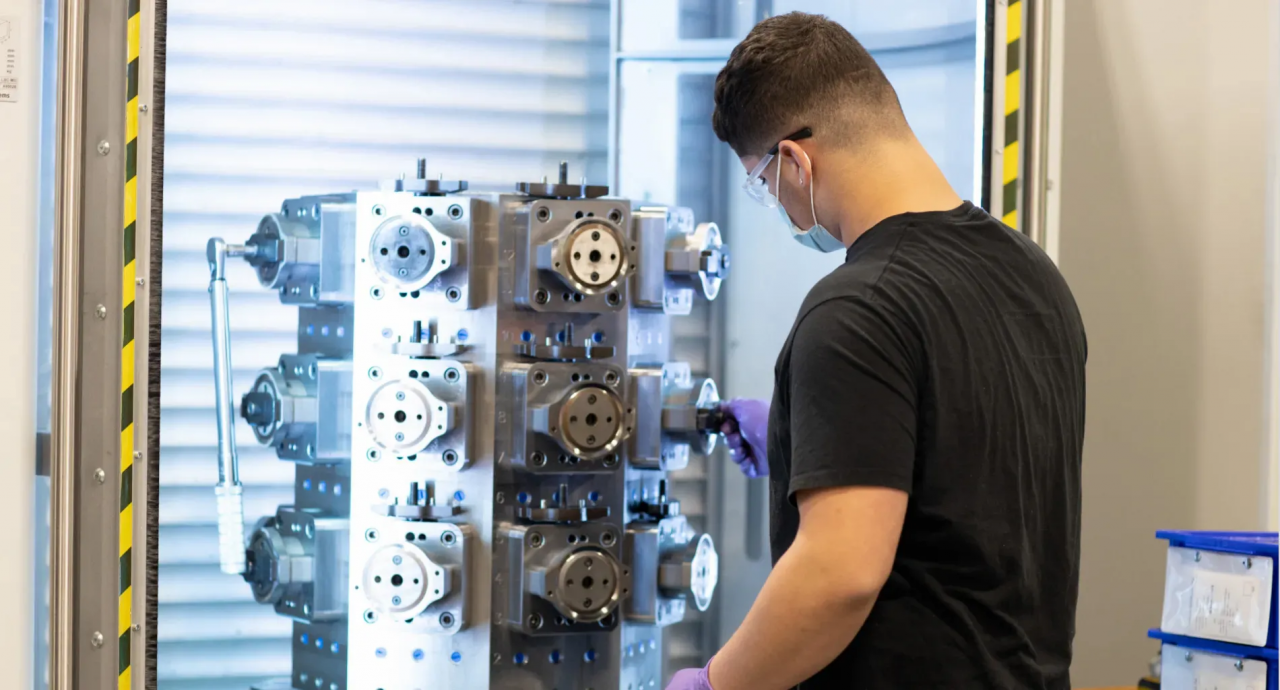 Stanley black and decker employee working on a machine