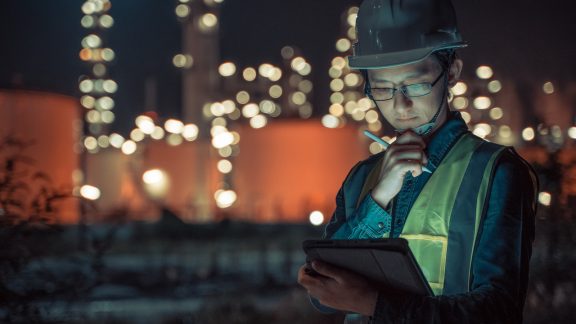 Construction worker using a tablet. 