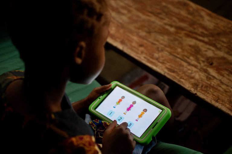 A child in Malawi learning math on onebillion’s onetab device
