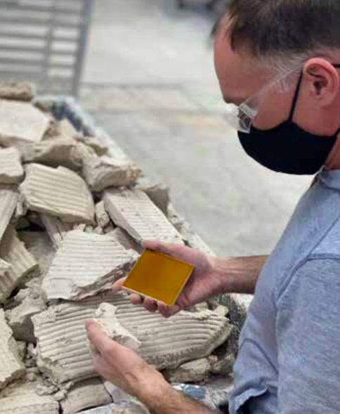 person looking at landfill waste