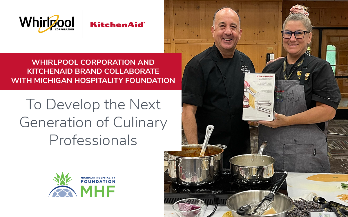Two people standing behind a stove with pots of food. One holds a box for a kitchen aid pasta maker. "To Develop the next generation of culinary professionals. MHF and Whirlpool logos.