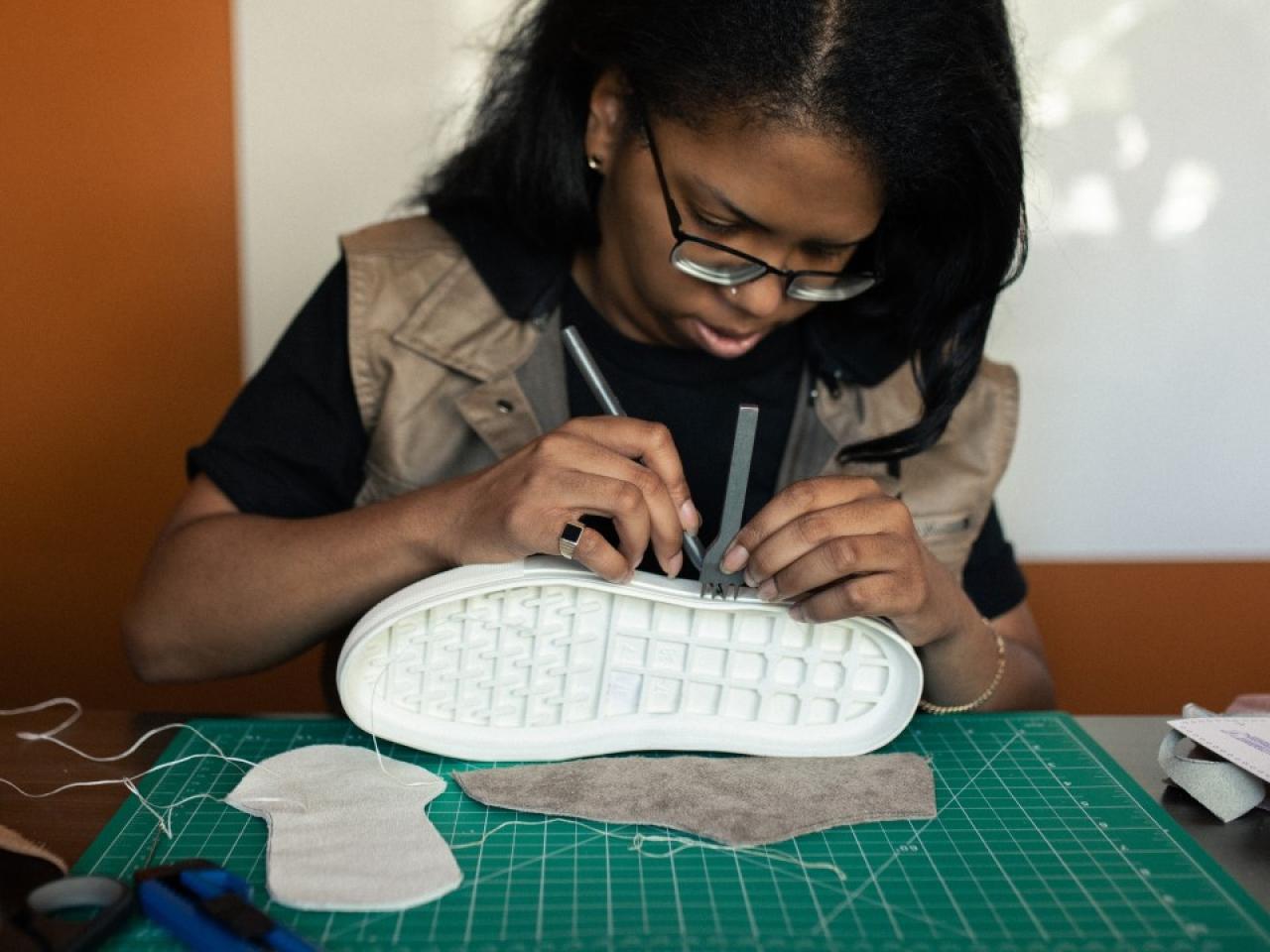 Shavonn working on a shoe design
