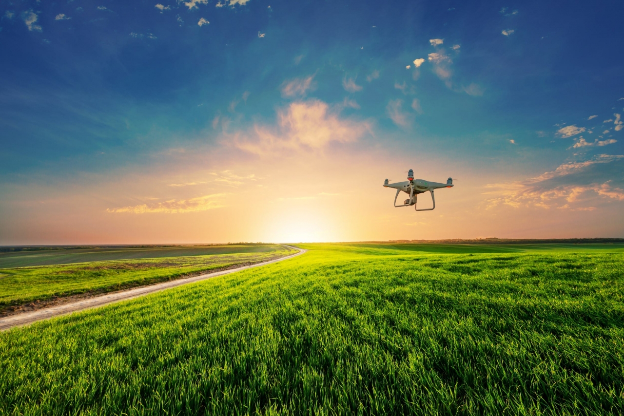 Drone flying over farm fields