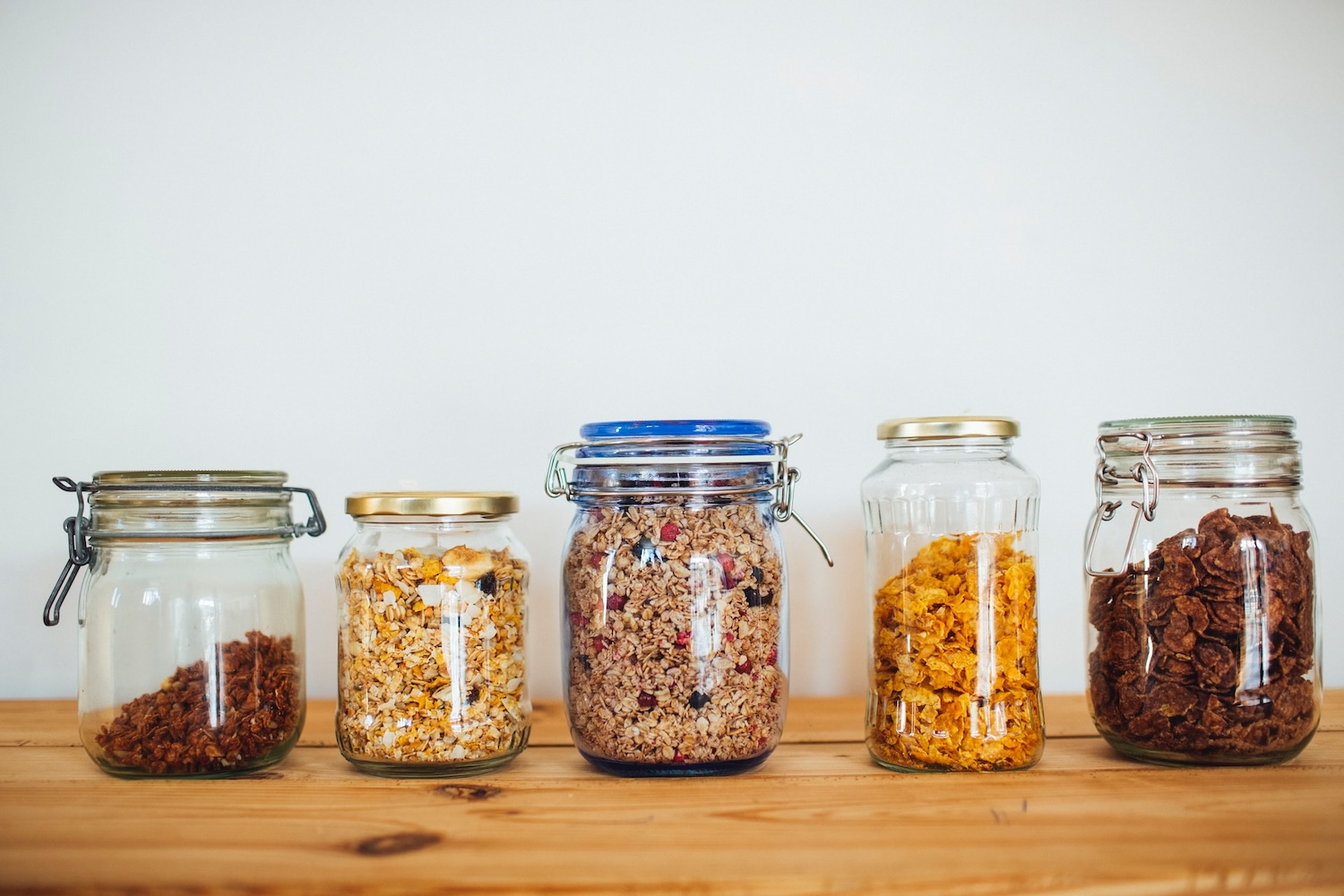 dry goods in glass jars - shop in the bulk aisle to reduce waste - sustainable habits for 2024