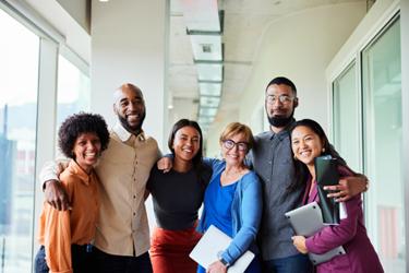 group of employees smiling