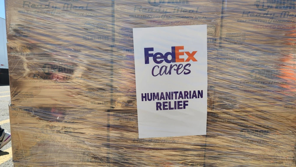 FedEx Cares Humanitarian Relief sticker on pallet