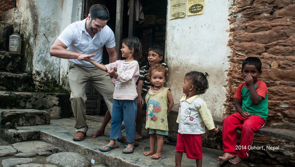 person with a group of children