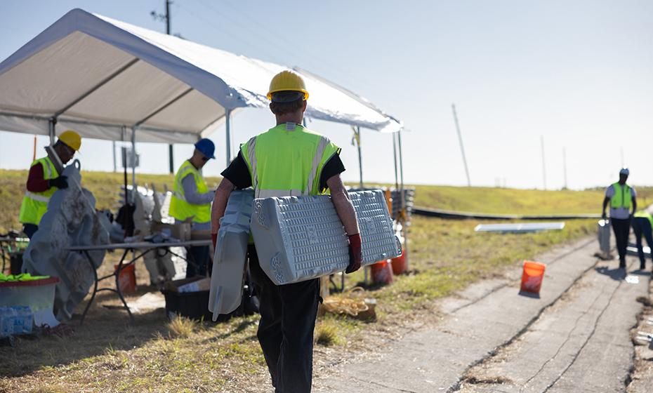 Worker carrying equipment 