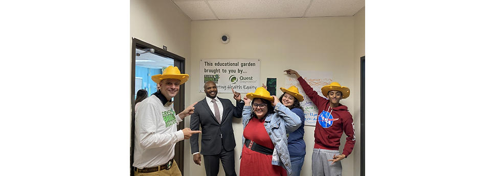 students being silly wearing straw hats